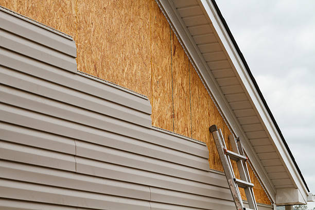 Professional Emergency Siding Repair technician working in Garrett, TX